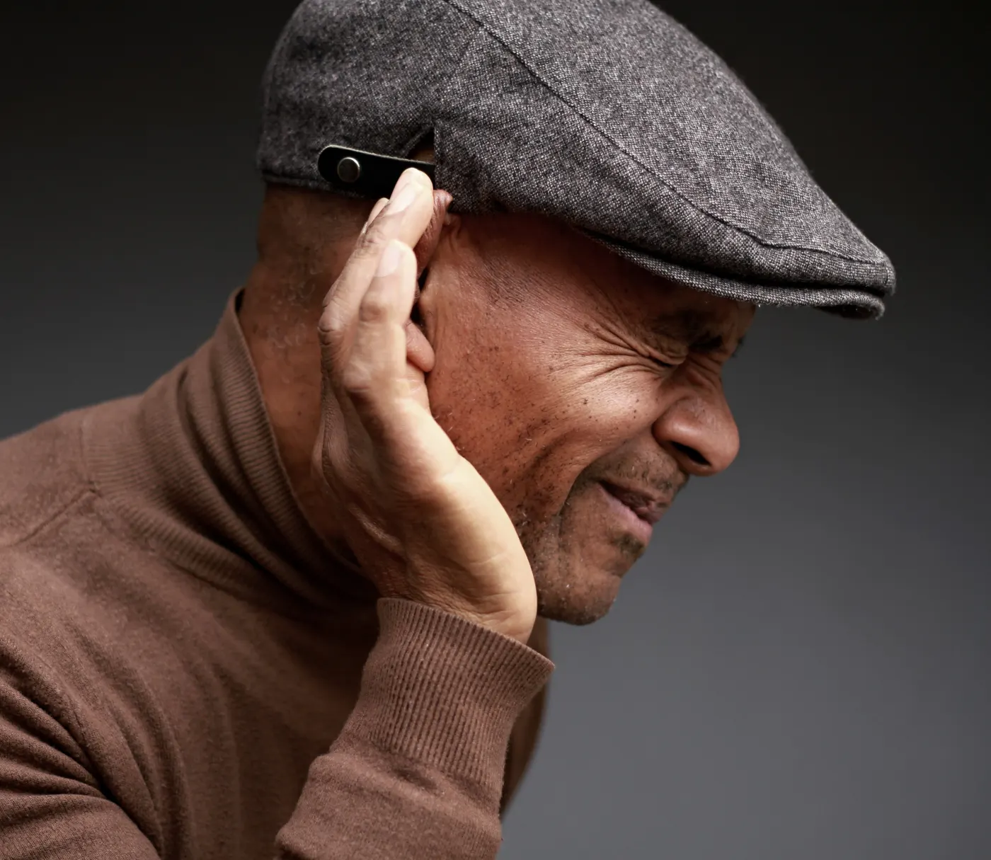 Person experiencing tinnitus / ringing in ears